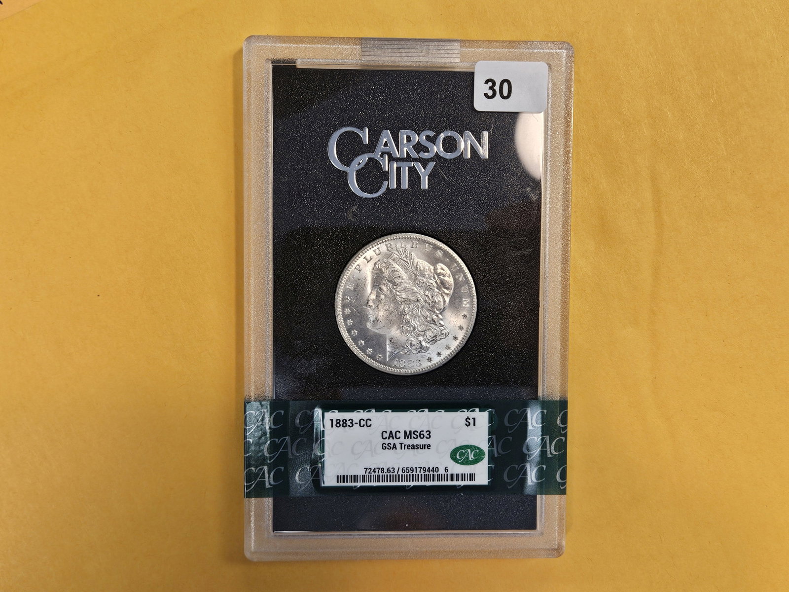 ** KEY DATE ** CACG 1883-CC Morgan Dollar in Mint State 63 - 2