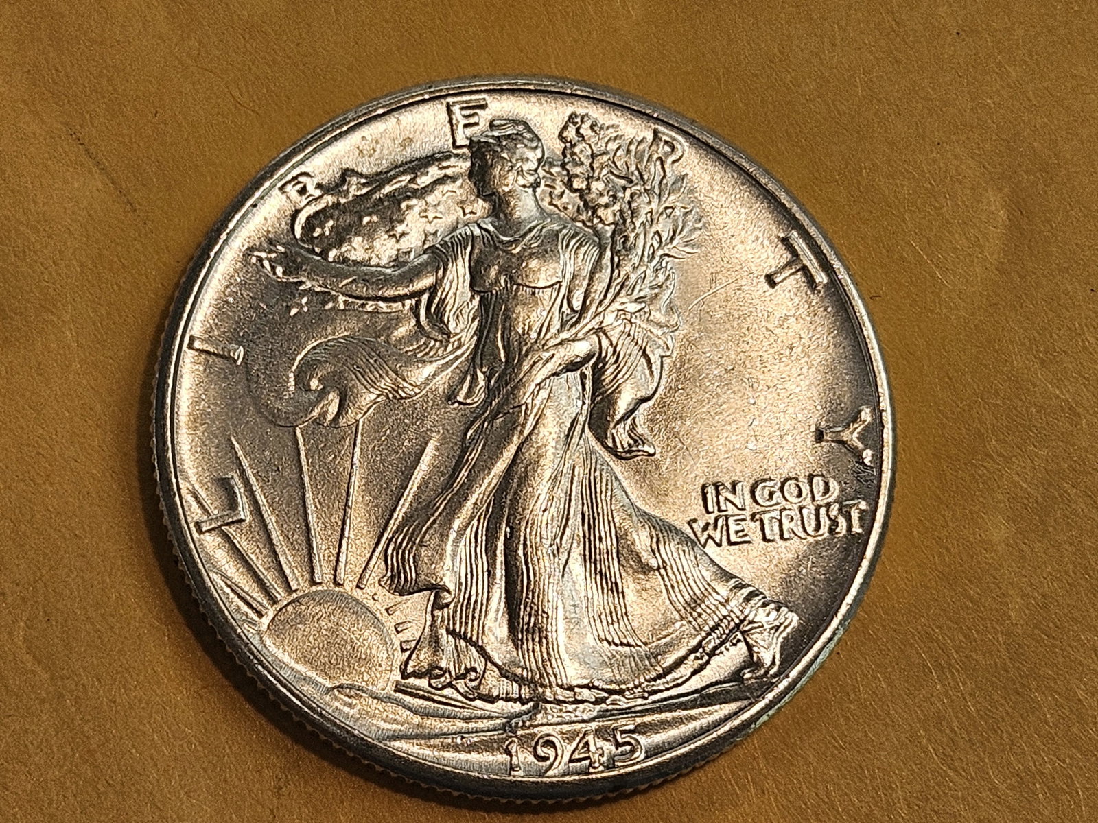 Choice Brilliant Uncirculated 1945 Walking Liberty Half Dollar: Choice luster