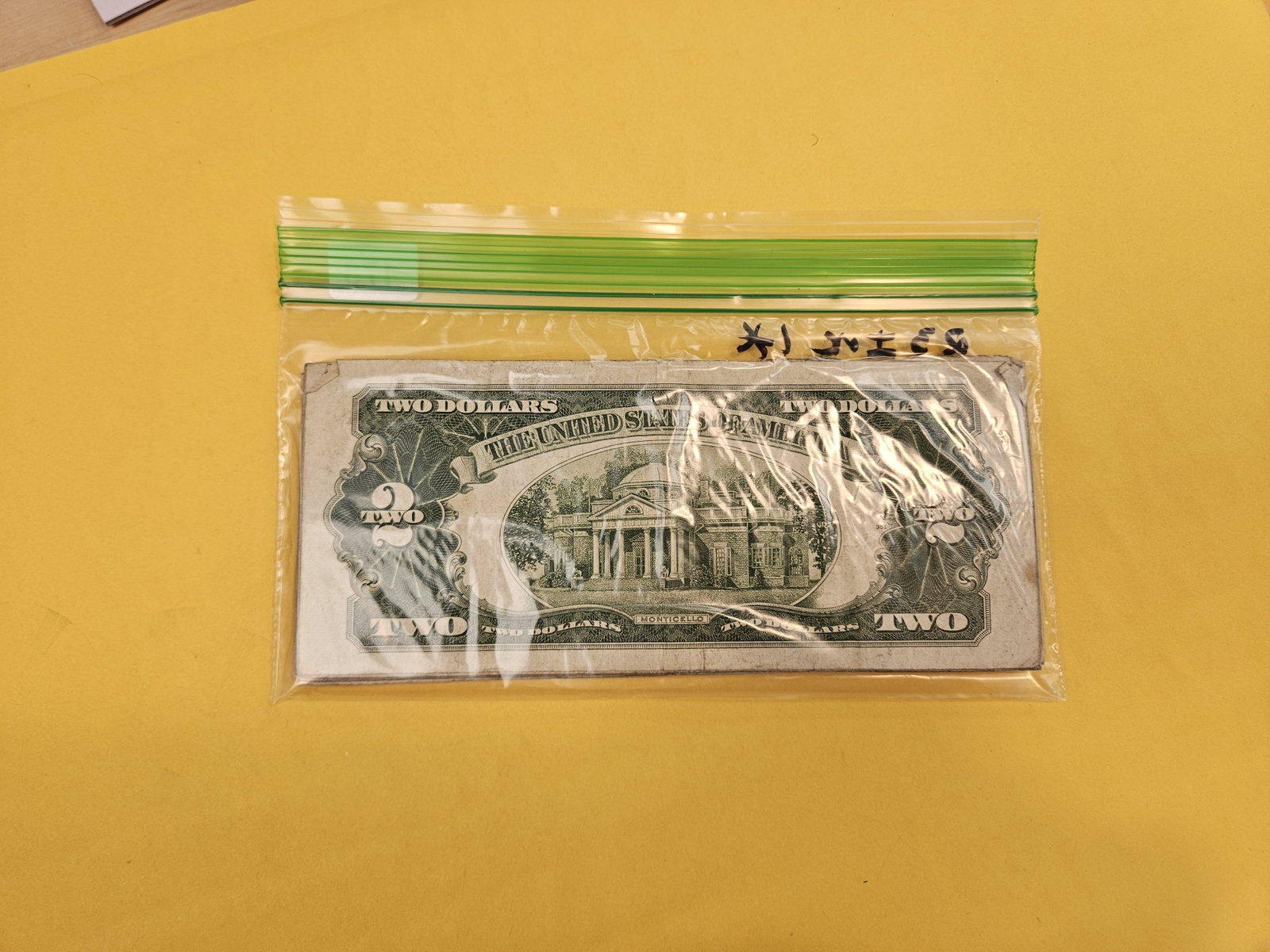 Twenty-three Two Dollar US Red Seal Notes - 2