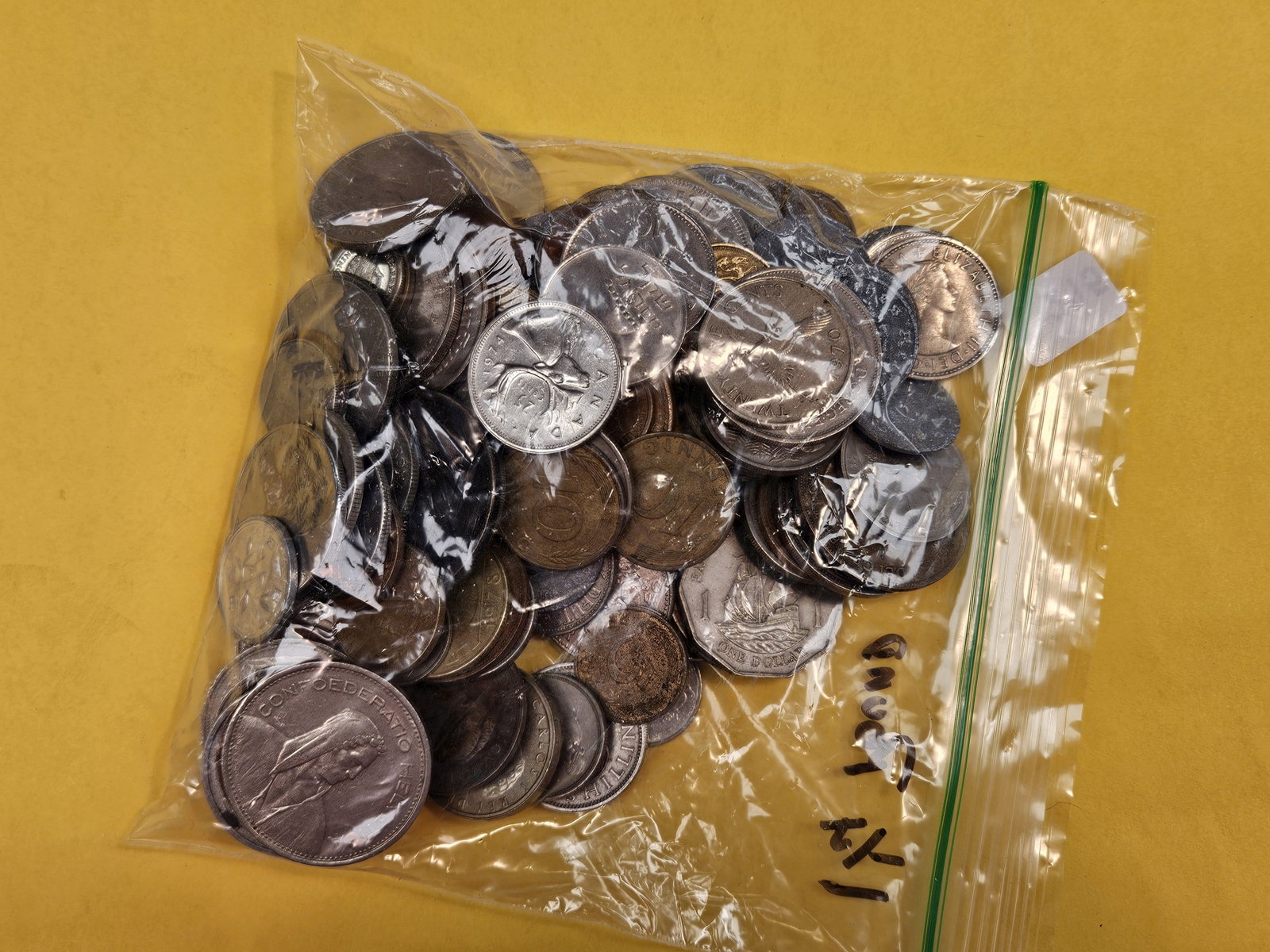 One and one-quarter pound of mixed World Coins - 2
