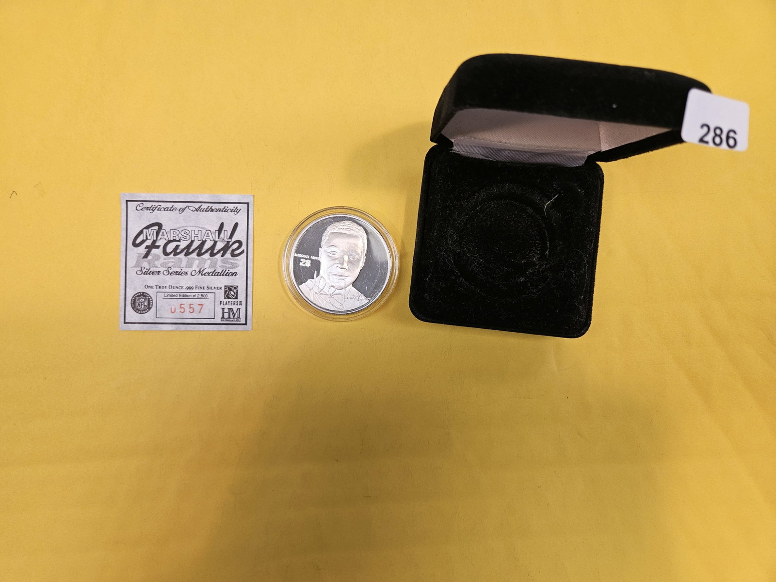One Troy ounce .999 fine Proof silver art round: Marshall Faulk. With COA