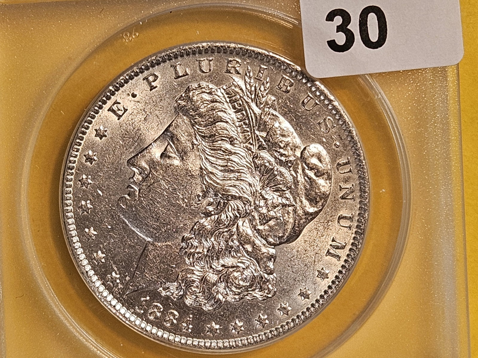 ANACS 1884-O Morgan Silver Dollar in About Uncirculated - 58: Sharp!