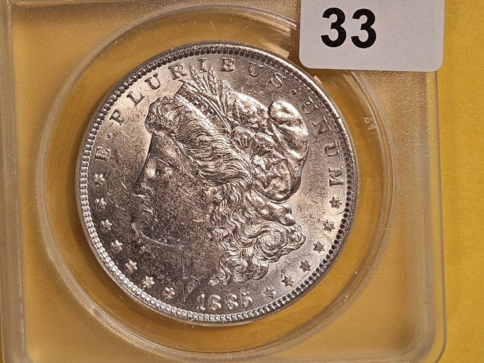 ANACS 1885 Morgan Silver Dollar in About Uncirculated - 50: Good reflectivity