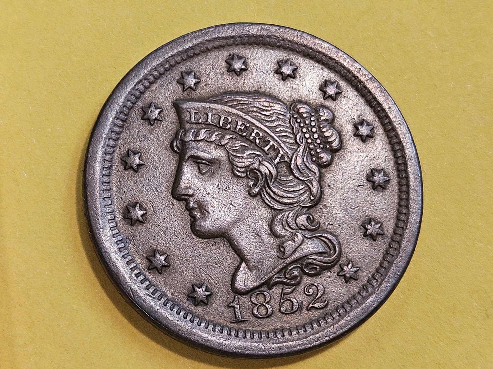 1852 Braided Hair large Cent in About Uncirculated - 58: Light tan brown color with a little bit of original luster. Looks MS