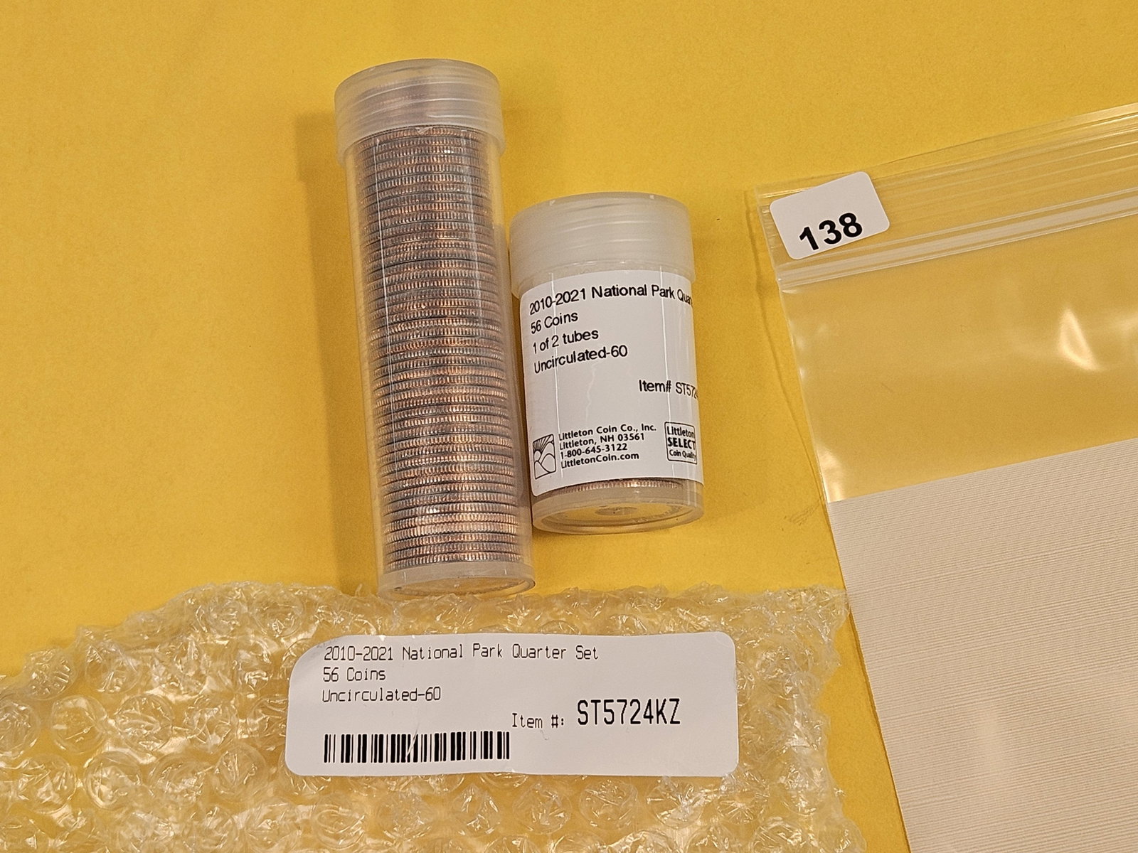 Two Rolls of Brilliant Uncirculated Washington Quarters: Fifty-six total coins. In original tubes from Littleton Coins. 2010 - 2021 National Park Quarter Set. Unopened, unchecked by us