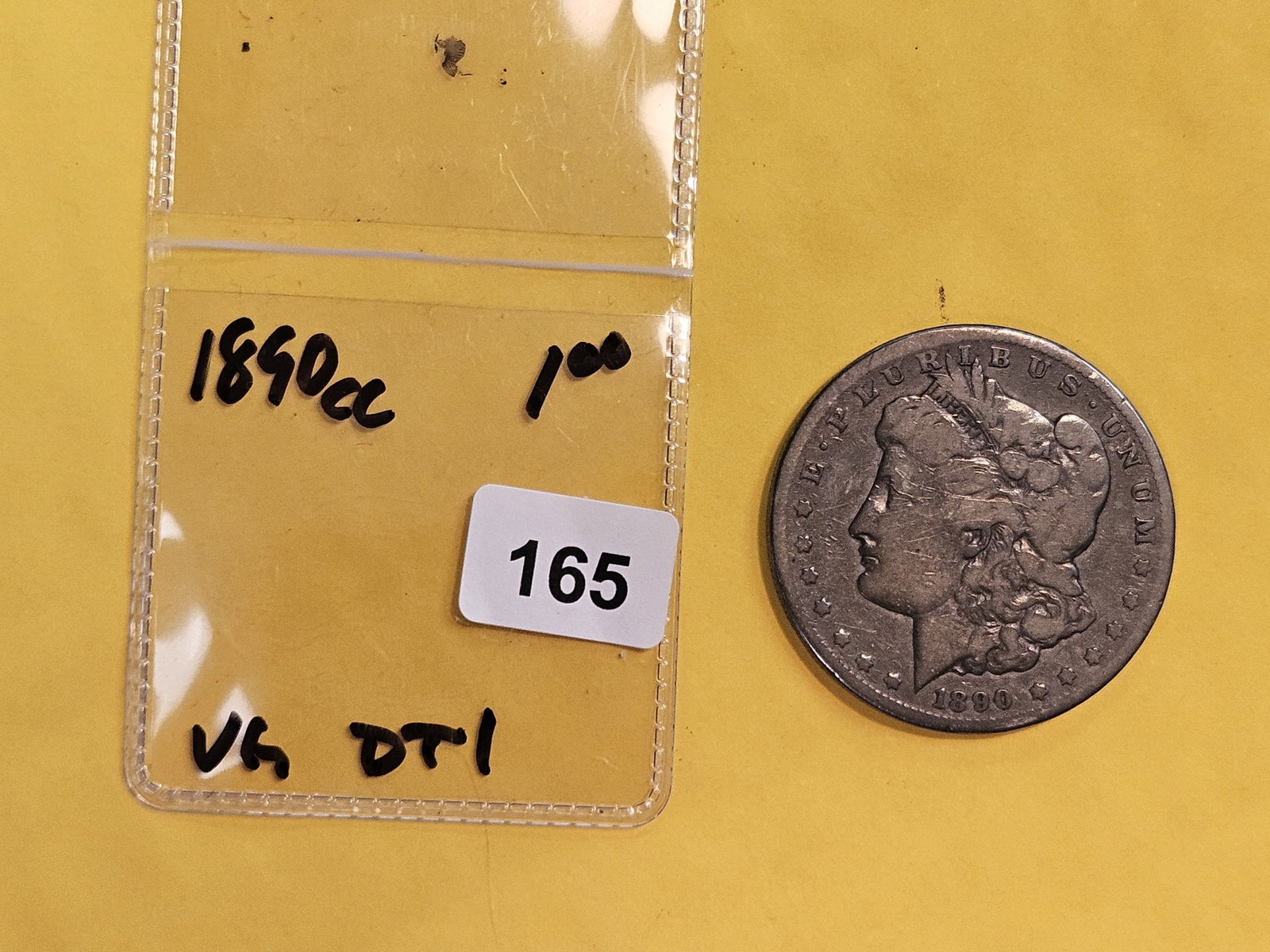 ** KEY DATE ** 1890-CC Morgan Dollar in Very Good - details - 2