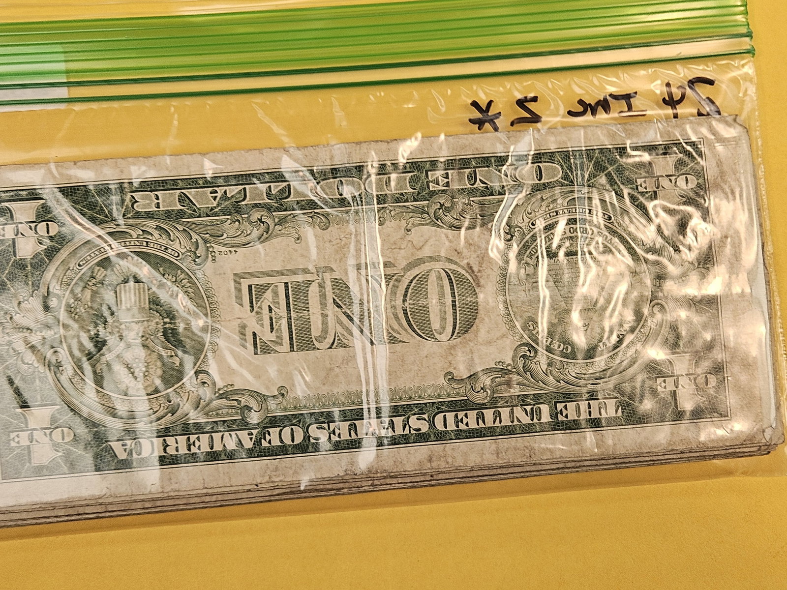 Twenty-four $1 Silver Certificates - 2