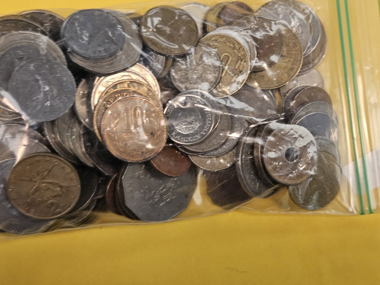 One and one-half Pounds of mixed World coins - 2