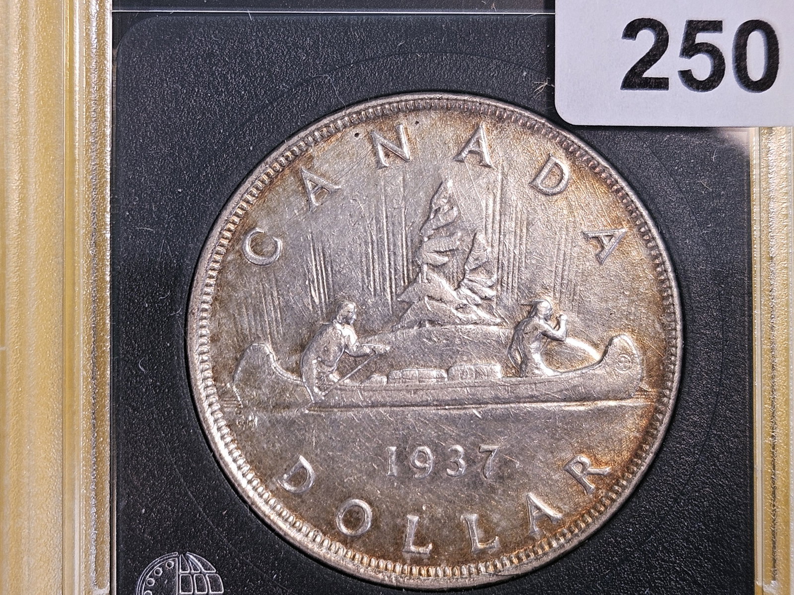 Brilliant About Uncirculated plus - details 1937 Canada Silver Dollar: KM 37. Light scratches. Toned