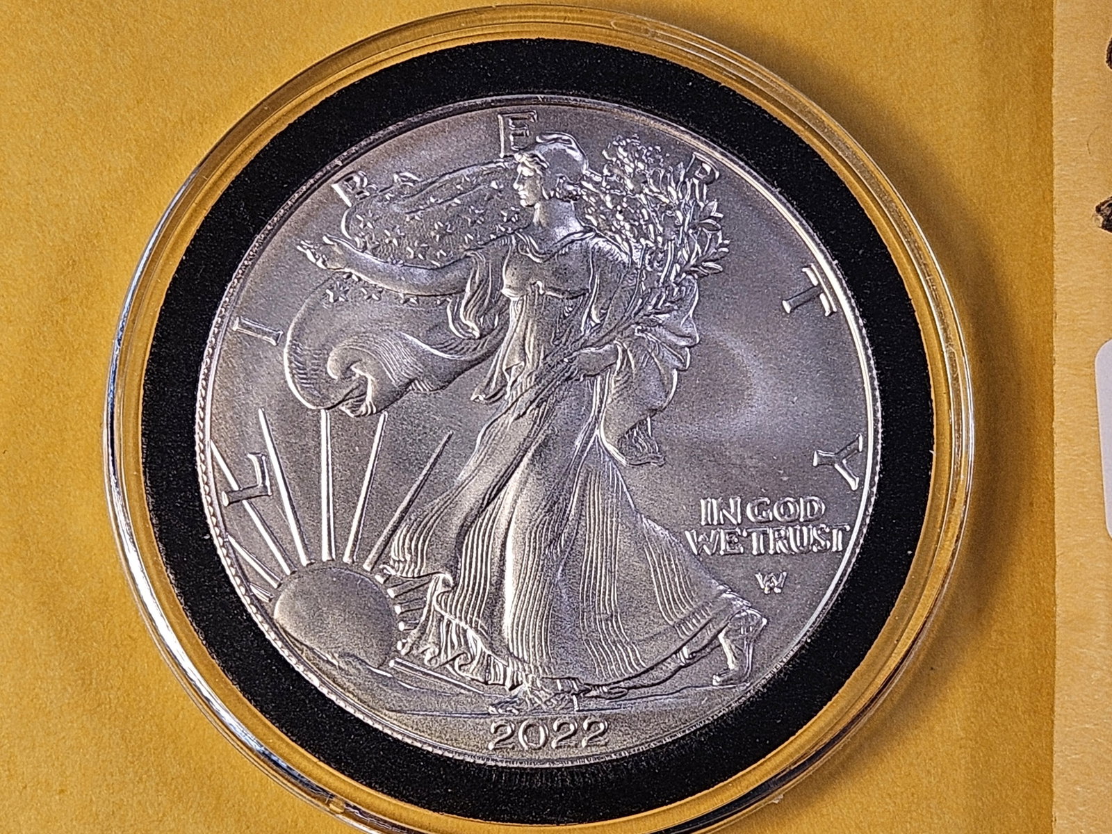 GEM Brilliant Uncirculated 2022 American Silver Eagle: In Plastic Capsule. Shimmering cartwheel!