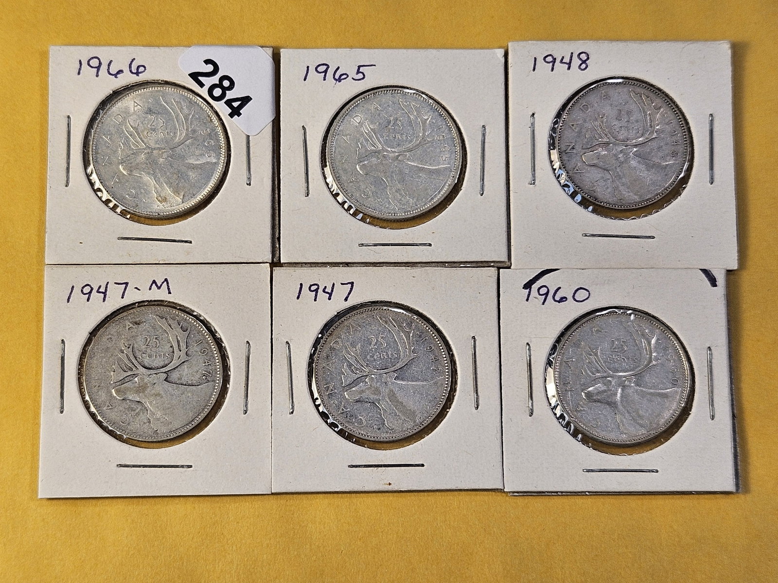 Six Canadian Silver Quarters: Mixed dates and Grades