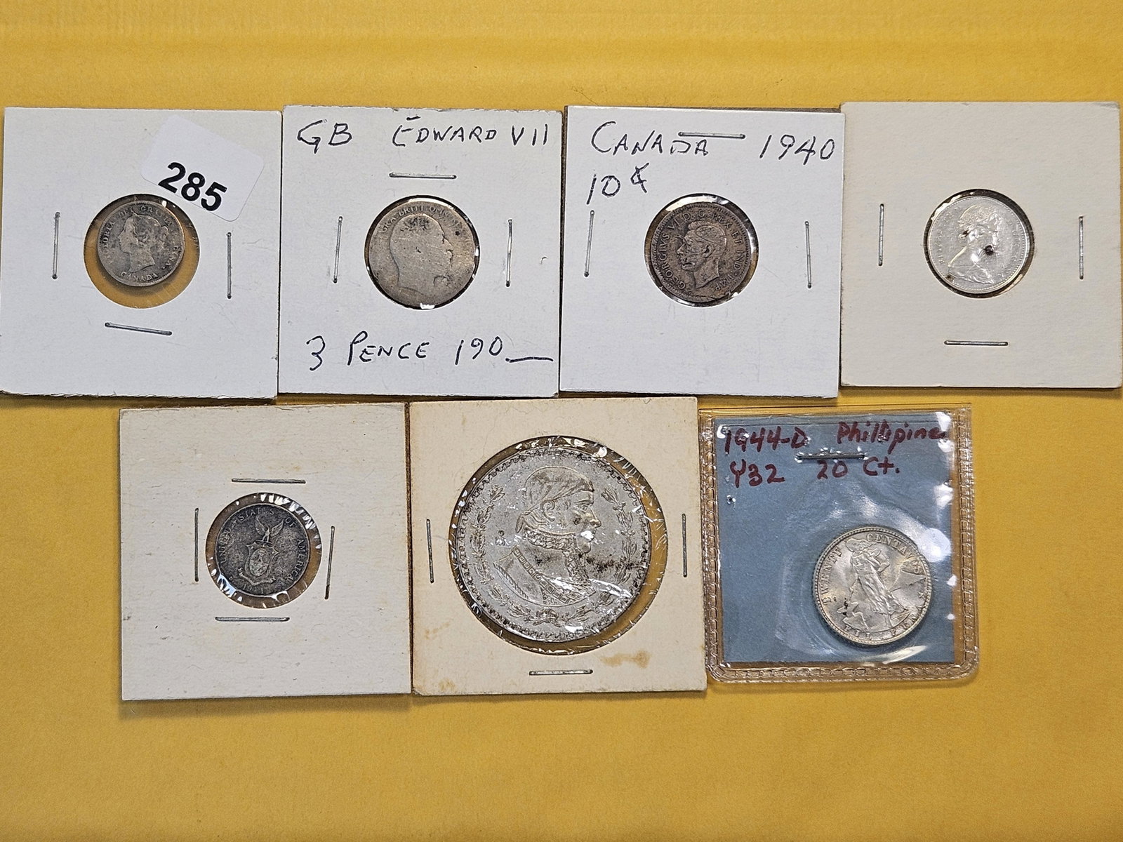 Seven Foreign Silver Coins: From Canada, Great Britain, Mexico and Philippines