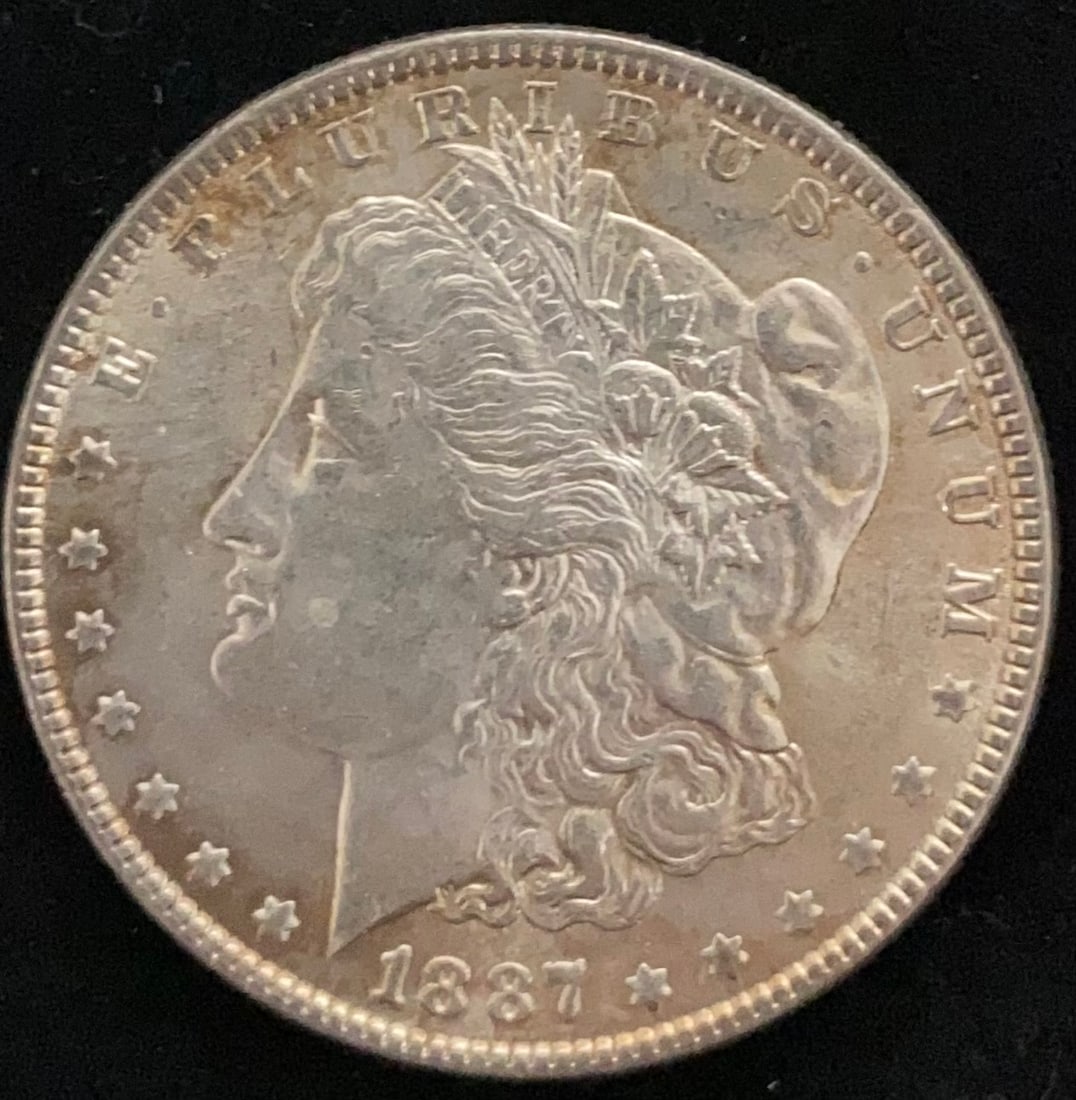 1887 Morgan Silver Dollar Lightly Toned (1 of 2)