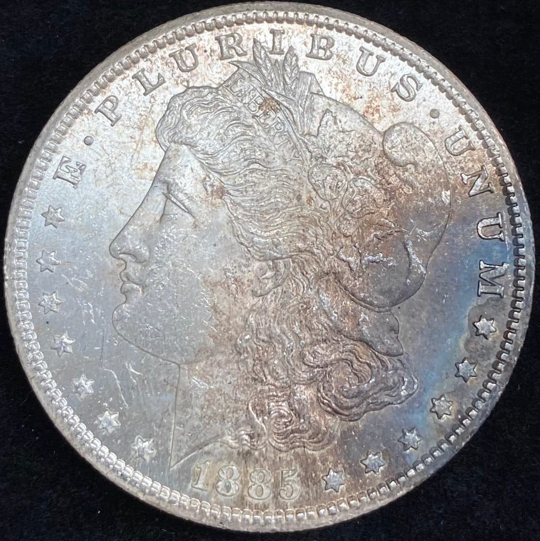1885-CC Morgan Silver Dollar Toned (1 of 2)