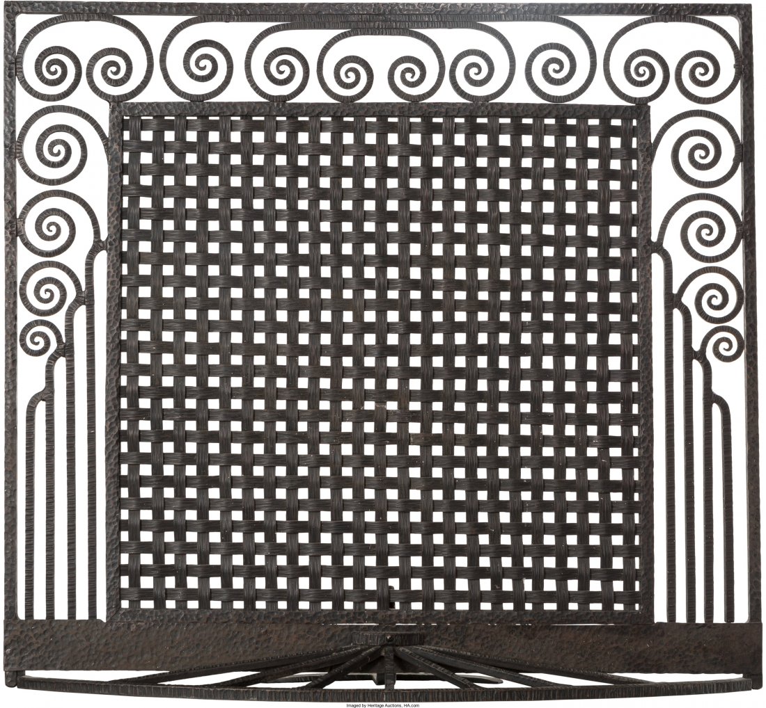 An Art Deco Wrought Iron Firescreen in the Style: An Art Deco Wrought Iron Firescreen in the Style of Edgar Brandt, circa 1925 33-1/4 h x 36-1/4