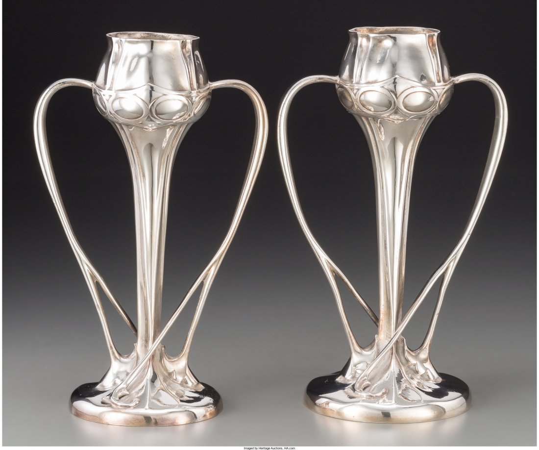 A Pair of Archibald Knox Tudric Silver-Plated Pe: A Pair of Archibald Knox Tudric Silver-Plated Pewter Vases for Libe