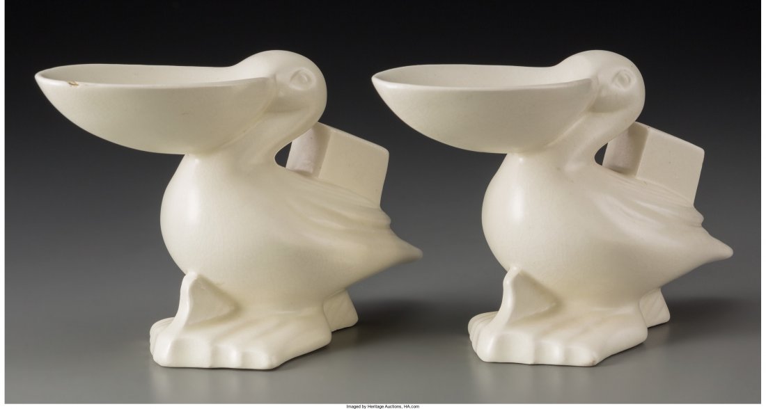 A Pair of Art Deco Glazed Earthenware Pelican-Fo: A Pair of Art Deco Glazed Earthenware Pelican-Form Sweetmeat Dishes in the Manner of Edgar Brandt<