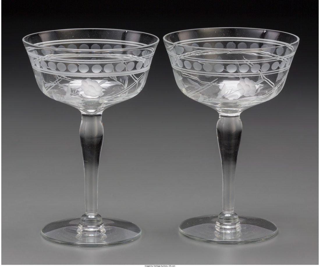 A Set of Nine Glass Champagne Coupes with Intagl: A Set of Nine Glass Champagne Coupes with Intaglio Floral Design, 20th century 5-7/8 i