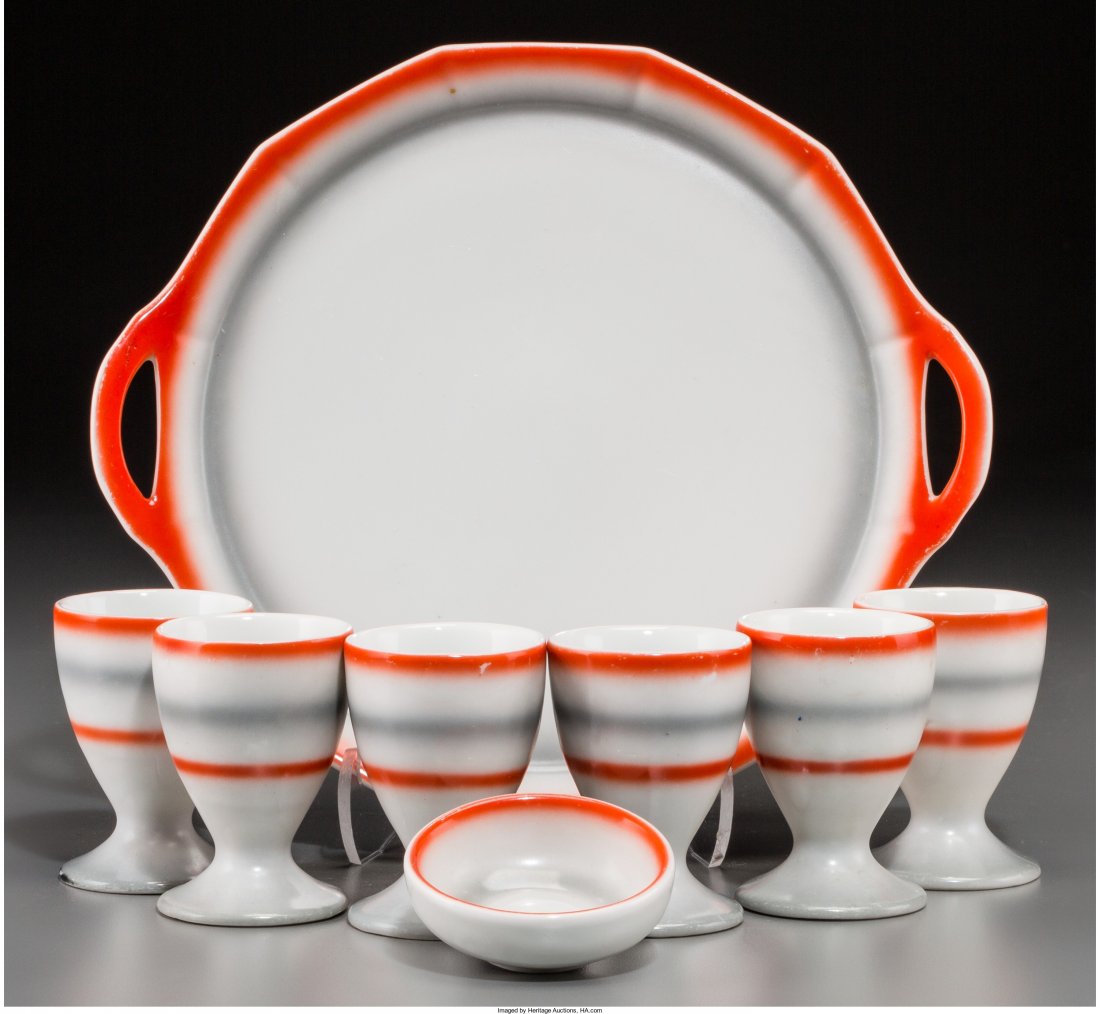 An Eight-Piece Spritzdekor Art Deco Ceramic Egg: An Eight-Piece Spritzdekor Art Deco Ceramic Egg Cup Set, circa 19308-1/8 inches wide
