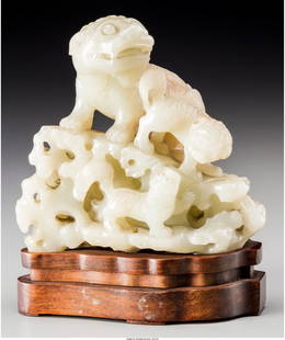 A Chinese Carved White Jade Figure: Fu Lion Grou: A Chinese Carved White Jade Figure: Fu Lion Group on Open Rockwork,&nbsp;Qing Dynasty, 18th -1