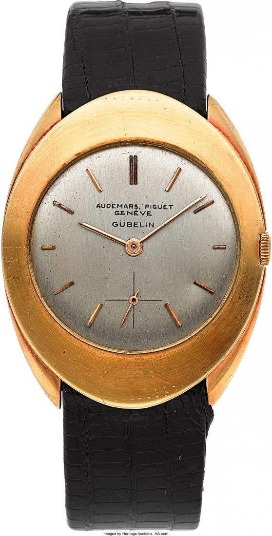 Audemars Piguet Unusual 18K Gold Oval Wristwatch: Audemars Piguet Unusual 18K Gold Oval Wristwatch Retailed By Gubelin, Ref. 5146BA, Circa 1960<