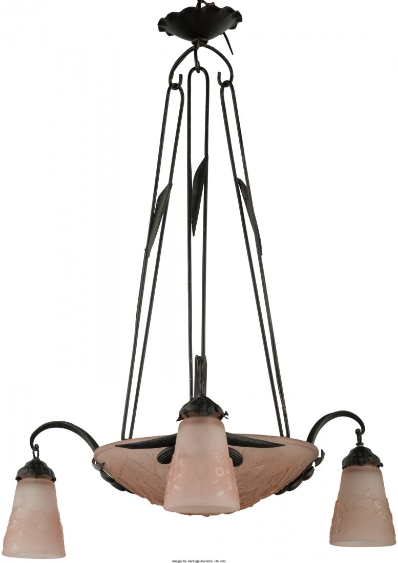A Muller Freres Art Deco Wrought-Iron and Froste: A Muller Freres Art Deco Wrought-Iron and Frosted Pink Glass Three-Light Chandelier, France, c