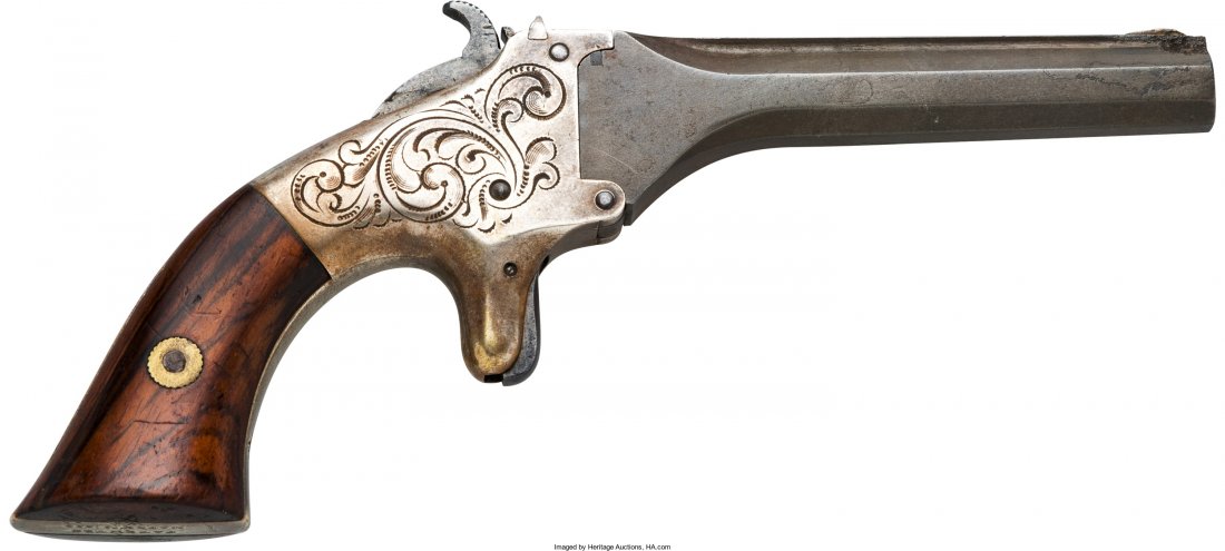 Engraved T.J. Stafford Single Shot Deringer. Se: Engraved T.J. Stafford Single Shot Deringer. Serial no. 775 [barrel and frame under g