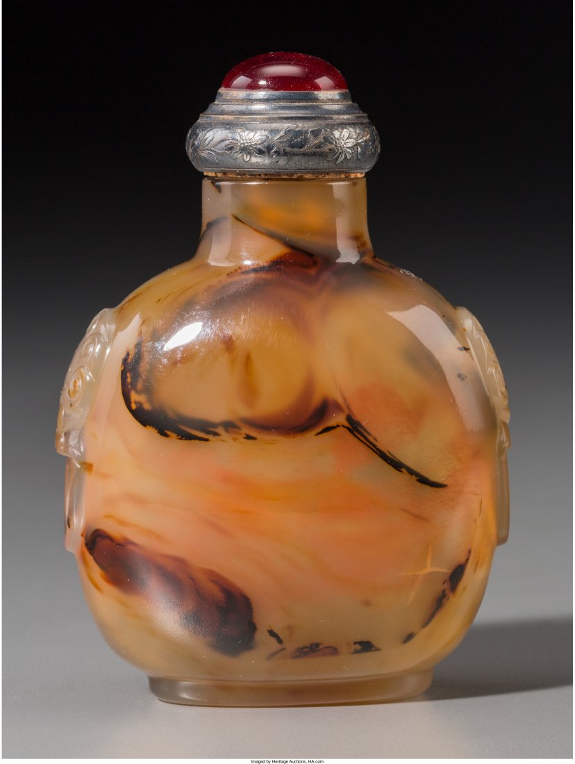 A Chinese Chalcedony Snuff Bottle with Carved Ma (1 of 2)