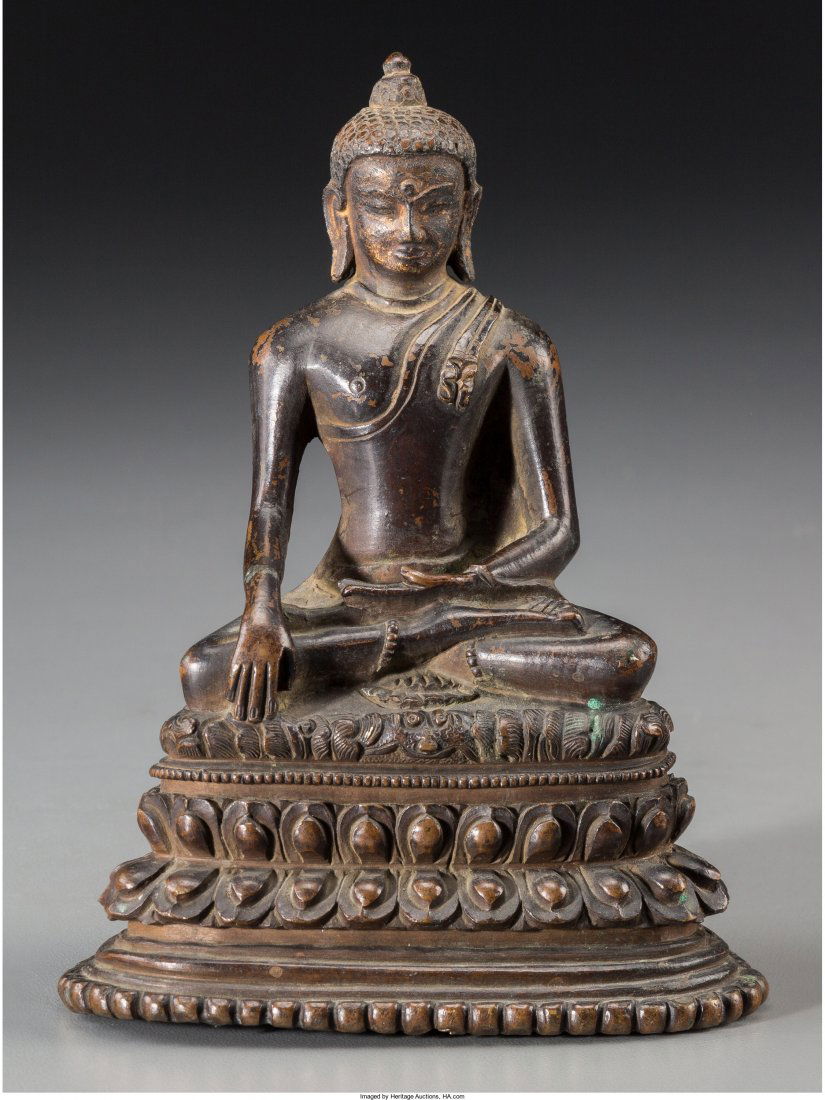 A Tibetan Copper Alloy Shakyamuni Buddha Figure, (1 of 2)