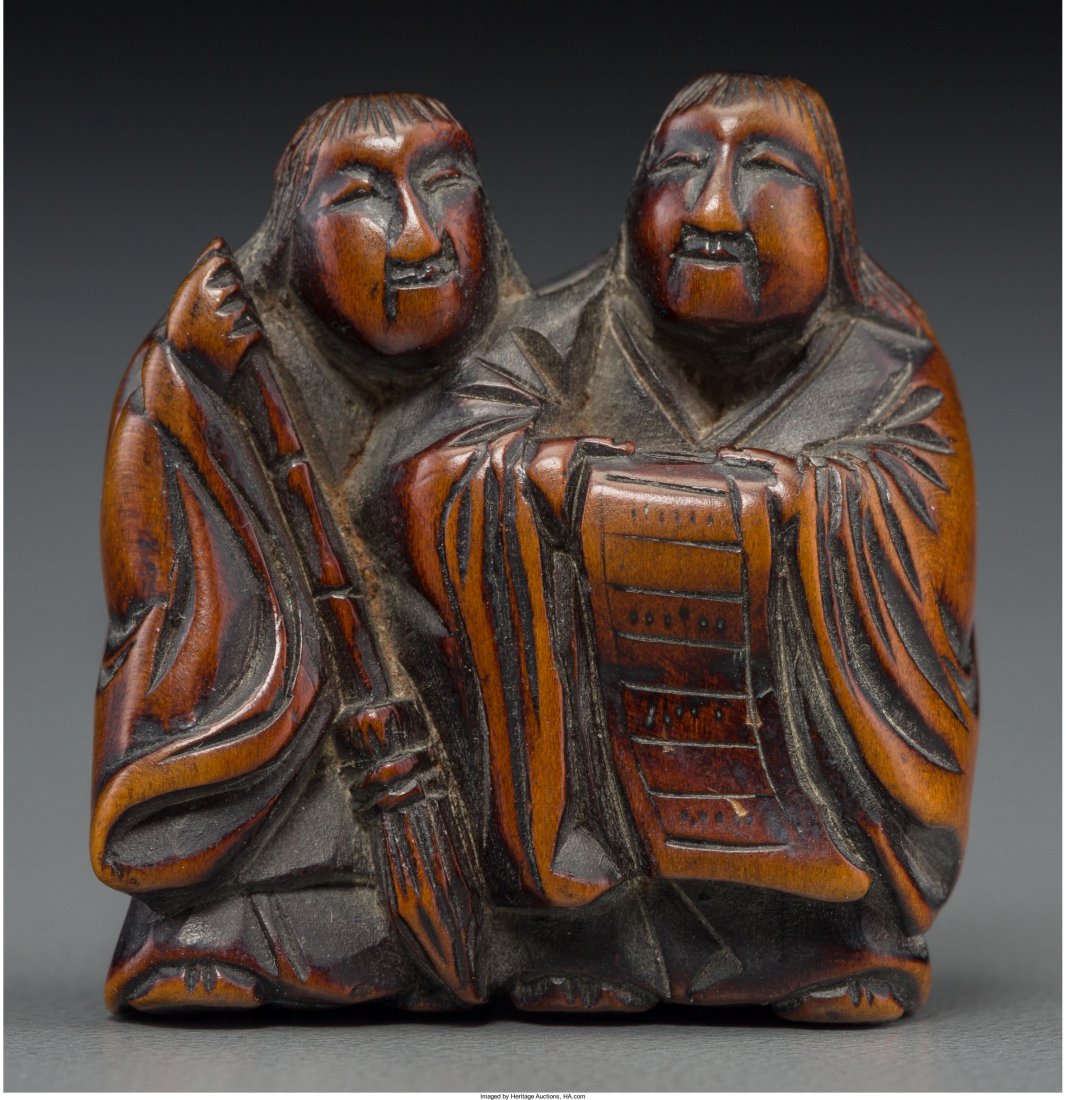 A Japanese Carved Boxwood Netsuke of Kanzan and : A Japanese Carved Boxwood Netsuke of Kanzan and Jittoku, Edo Period, 19th century Mark