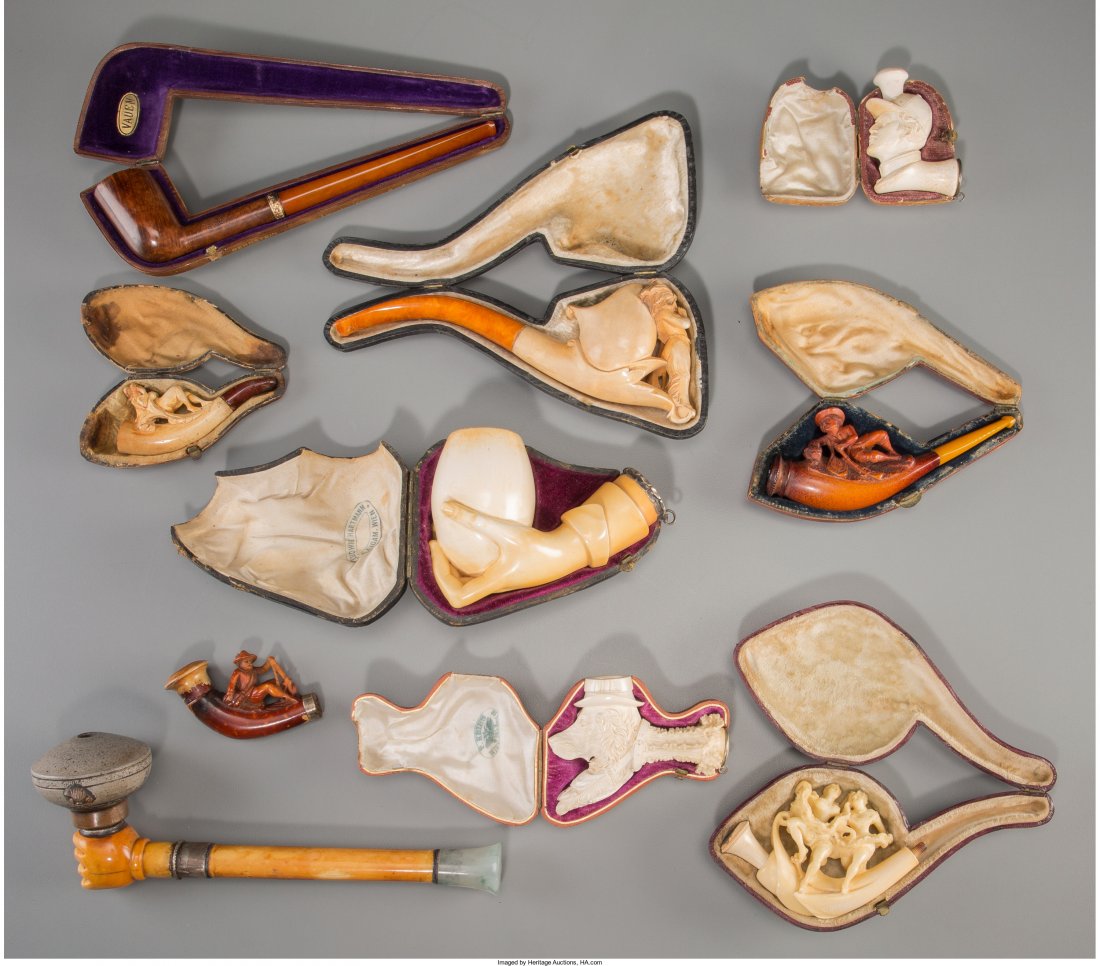 Ten Carved Meerschaum and Wood Figural Pipes, late 19th: Ten Carved Meerschaum and Wood Figural Pipes, late 19th century 8-5/8 inches long (21.9 cm) (largest) Including resting hunter, wood and celluloid example in classic pipe form, reclining hunter, Nativ