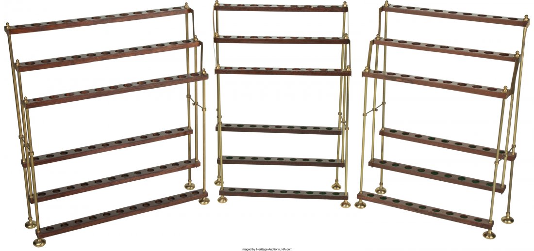 Three Oak and Brass Walking Stick Racks, 20th century: Three Oak and Brass Walking Stick Racks, 20th century 36 h x 30-1/2 w x 8-1/4 d inches (91.4 x 77.5 x 21.0 cm) (largest) Property from the Collection of Mr. Kenneth W. Davis, Fort Worth, Texas HID0490