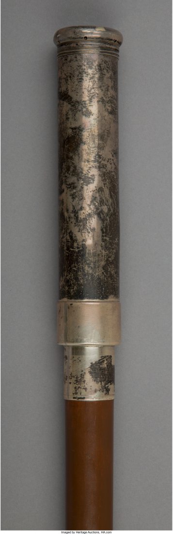 An English Microscope Walking Stick, London, 1921 early: An English Microscope Walking Stick, London, 1921 early 20th century 35-1/4 inches (89.5 cm) Property from the Collection of Mr. Kenneth W. Davis, Fort Worth, Texas The silver handle pulls off the pai