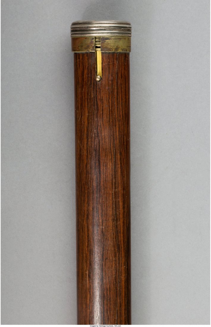 An English Rosewood Herbalist's Walking Stick, late: An English Rosewood Herbalist's Walking Stick, late 19th century 37-3/4 inches (95.9 cm) Property from the Collection of Mr. Kenneth W. Davis, Fort Worth, Texas The silver top untwists to reveal a com