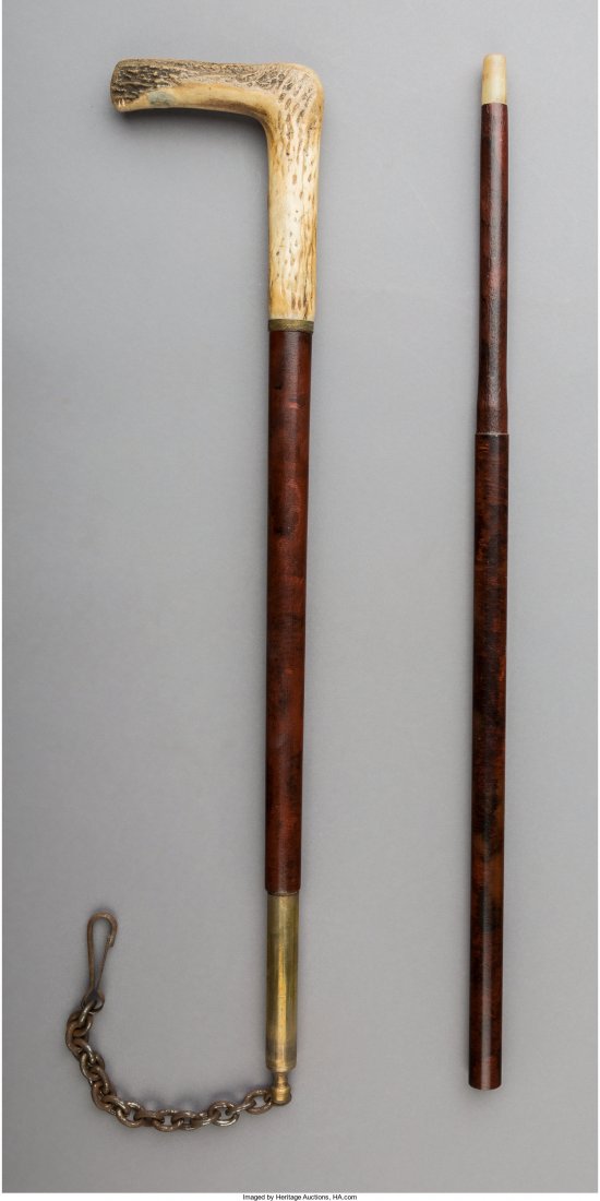 A Bone Handle Dog Lead Walking Stick, late 19th century: A Bone Handle Dog Lead Walking Stick, late 19th century 36-1/4 inches high (92.1 cm) Property from the Collection of Mr. Kenneth W. Davis, Fort Worth, Texas The bone handle and brass collar are fixed 