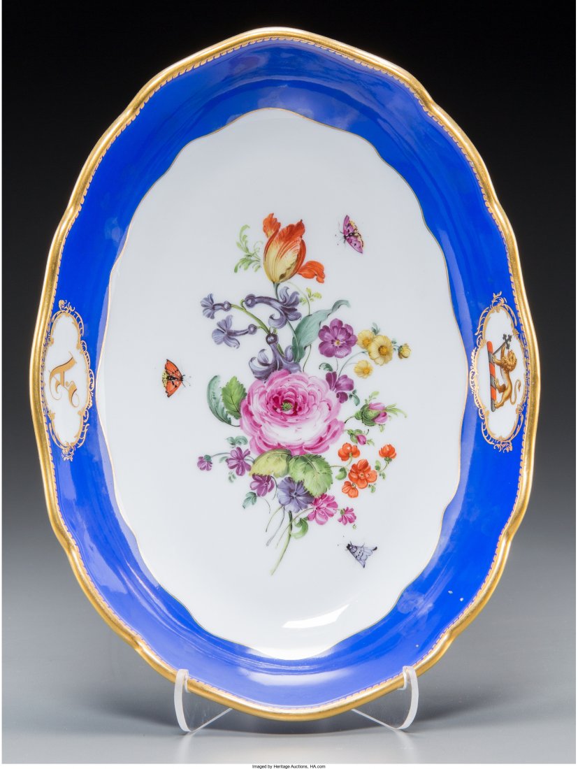 A Meissen Partial Gilt Porcelain Dish Bearing the Arms: A Meissen Partial Gilt Porcelain Dish Bearing the Arms of the Adams Family, 19th century Marks: (crossed swords) 1-7/8 h x 10-1/2 w x 7-3/4 d inches (4.8 x 26.7 x 19.7 cm) Property from the Estate of