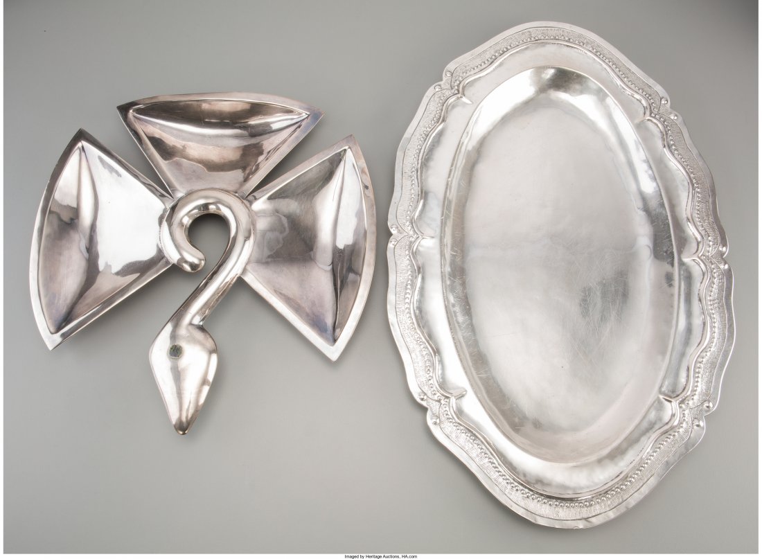 Two Mexican Silver and Silver-Plated Trays, 20th: Two Mexican Silver and Silver-Plated Trays, 20th century Marks to smaller: METALES CASTILLO, LOS CASTILLO, TAXCO, HANDWROUGHT, 42 11-3/8 inches high x 17-5/8 inches wide (28.9 x 44.8 cm) (larger) 31.4