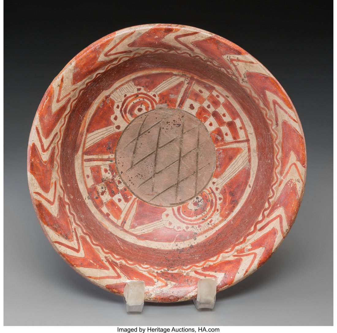 A Michoacan Tripod Bowl c. 400 - 200 BC This bo: A Michoacan Tripod Bowl c. 400 - 200 BC This bowl features elaborate paint and incising
