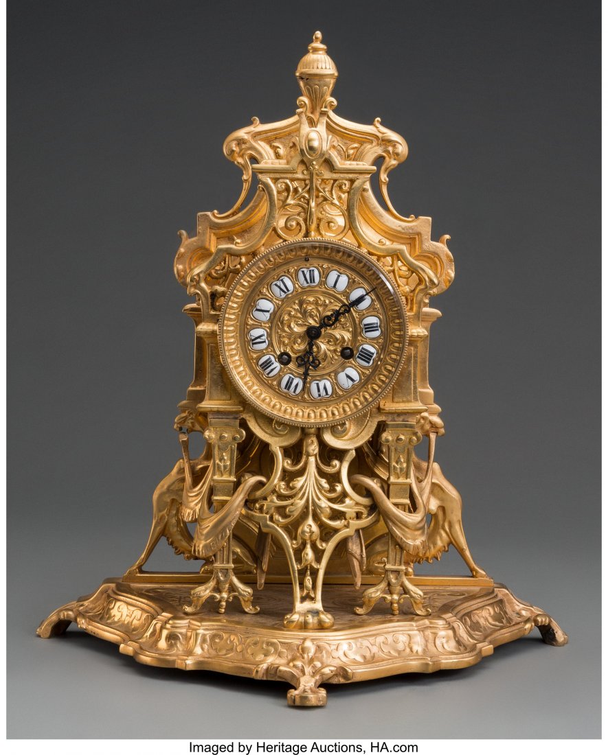 A Louis XV-Style Gilt Bronze Clock, third quarte: A Louis XV-Style Gilt Bronze Clock, third quarter 20th century 15-1/8 h x 13-1/4 w x 7 d i
