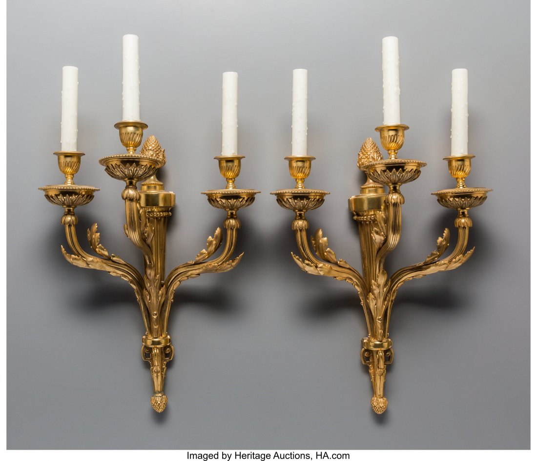 A Pair of Louis XVI-Style Gilt Bronze Three-Ligh: A Pair of Louis XVI-Style Gilt Bronze Three-Light Sconces24-1/2 inches high (62.2 cm) (eac