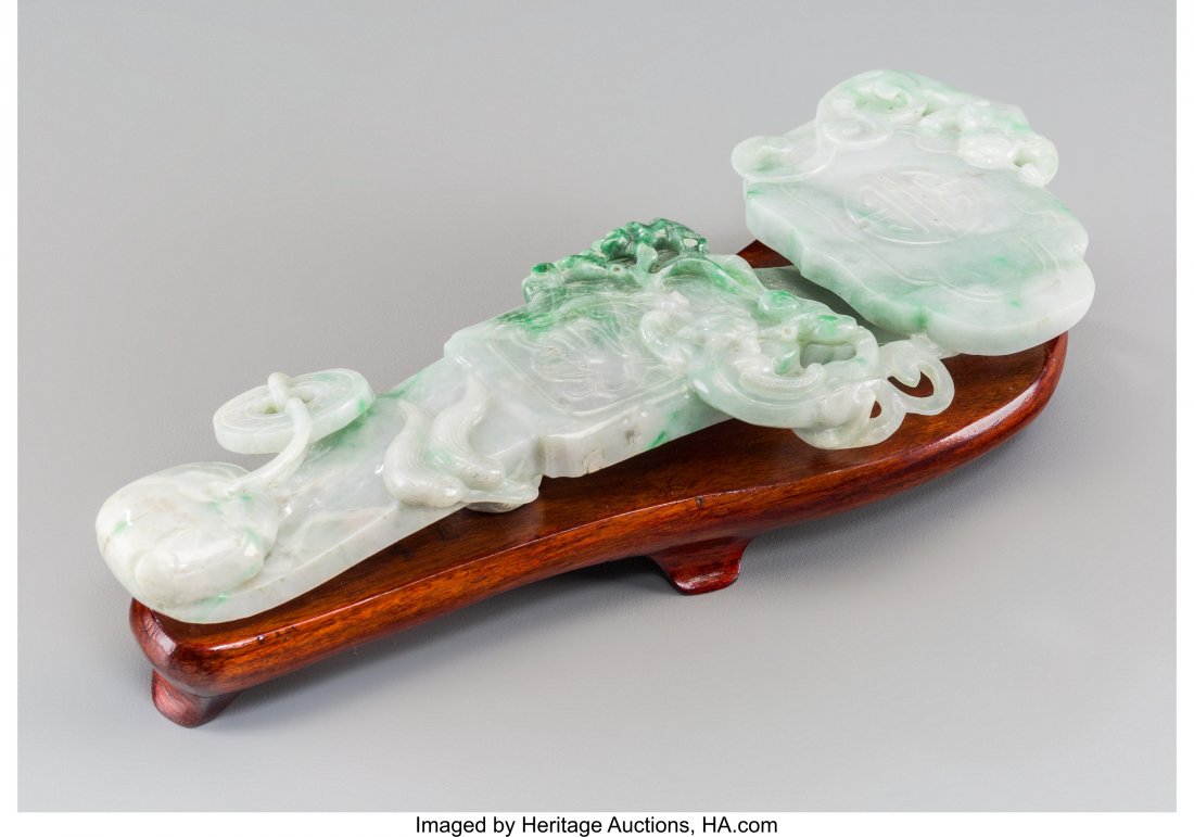 A Chinese Carved Jadeite Ruyi Scepter on Wooden : A Chinese Carved Jadeite Ruyi Scepter on Wooden Stand 1 h x 9-3/8 w x 4-1/4 d inches (2.5 x