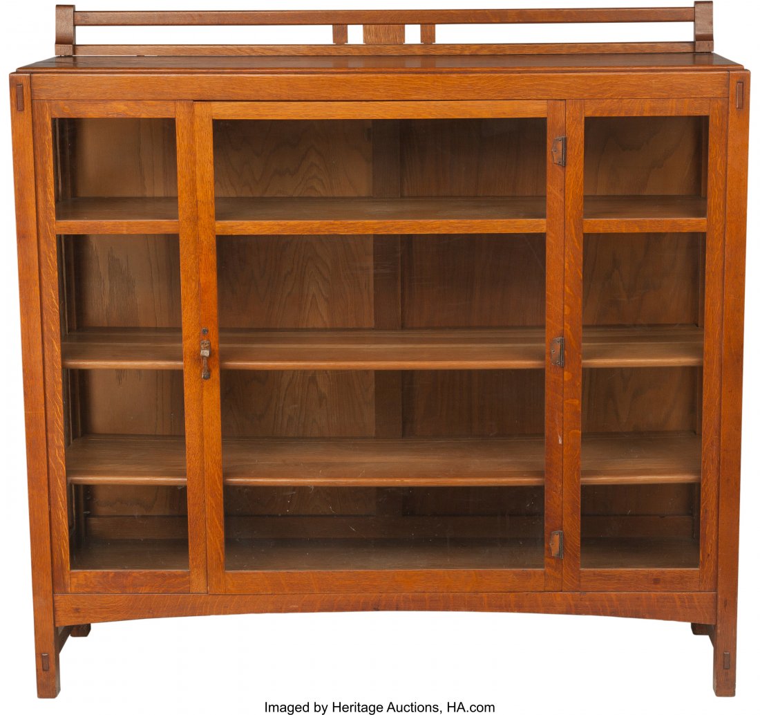A Limbert Arts & Crafts Oak and Glazed China Cab: A Limbert Arts & Crafts Oak and Glazed China Cabinet 58-1/2 h x 60 w x 16 d inches (148.6 x 152