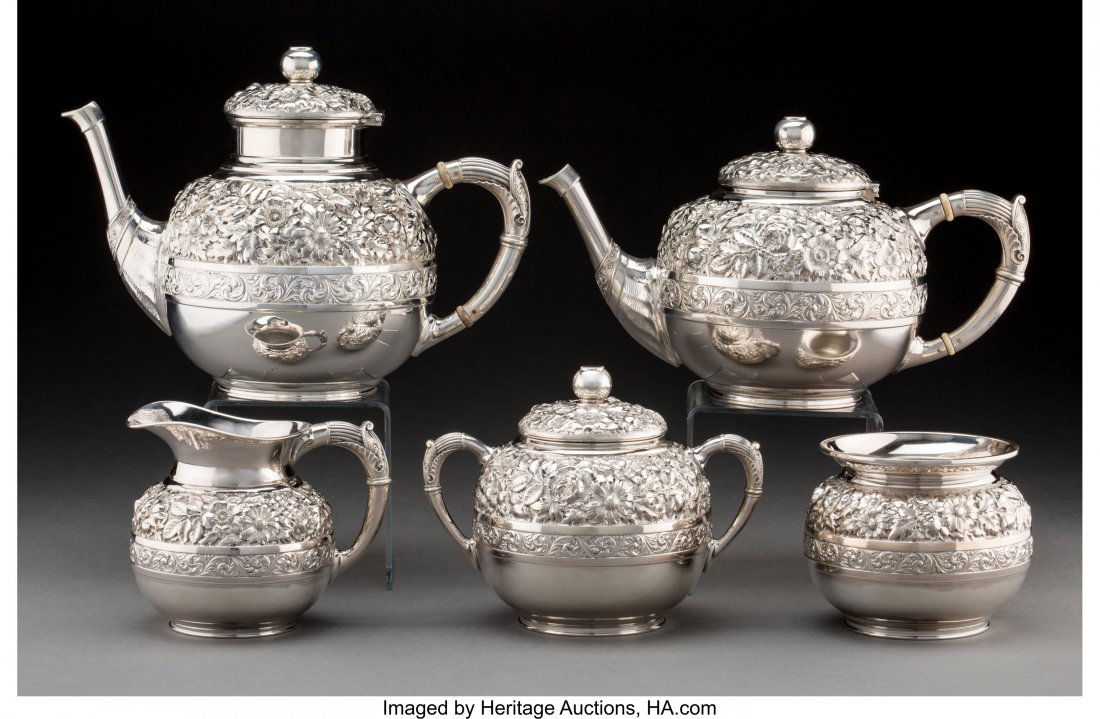 A Five-Piece Wood & Hughes Silver Floral Repouss (1 of 3)