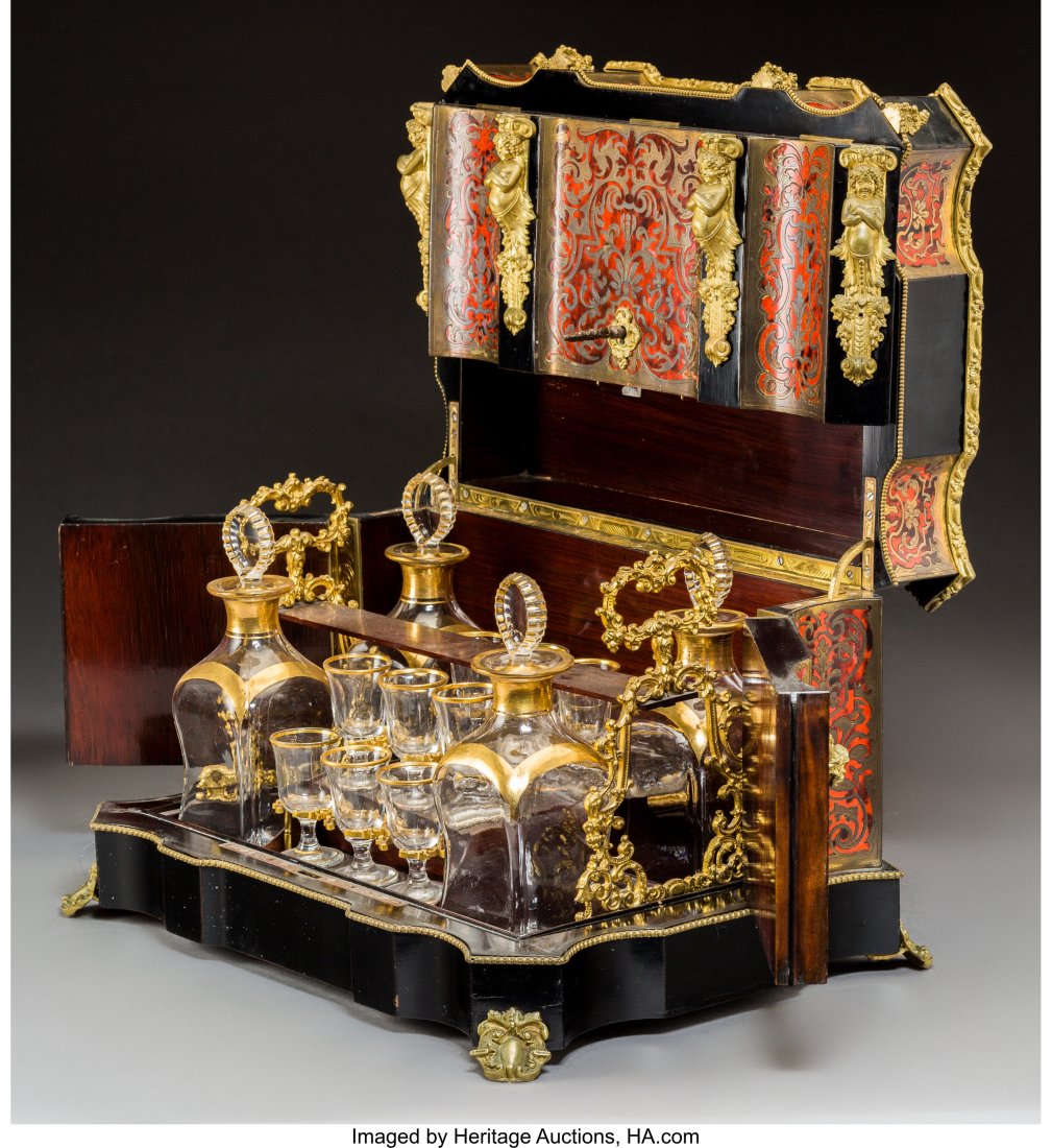 A Napoleon III Boulle, Ebonized Wood, and Gilt G: A Napoleon III Boulle, Ebonized Wood, and Gilt Glass Cave Ã Liqueur, circa 1870 11 h
