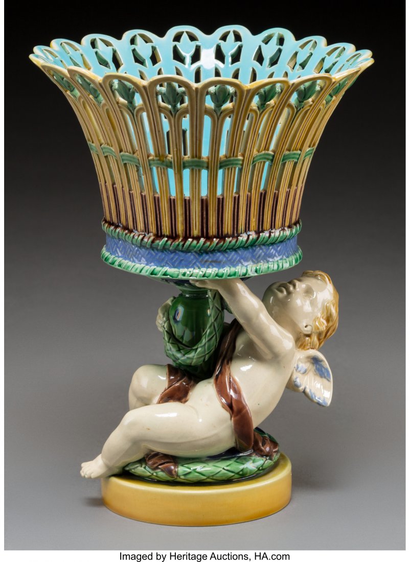 A Minton Majolica Reticulated Figural Centerpiec: A Minton Majolica Reticulated Figural Centerpiece, Stoke-on-Trent, Staffordshire, England