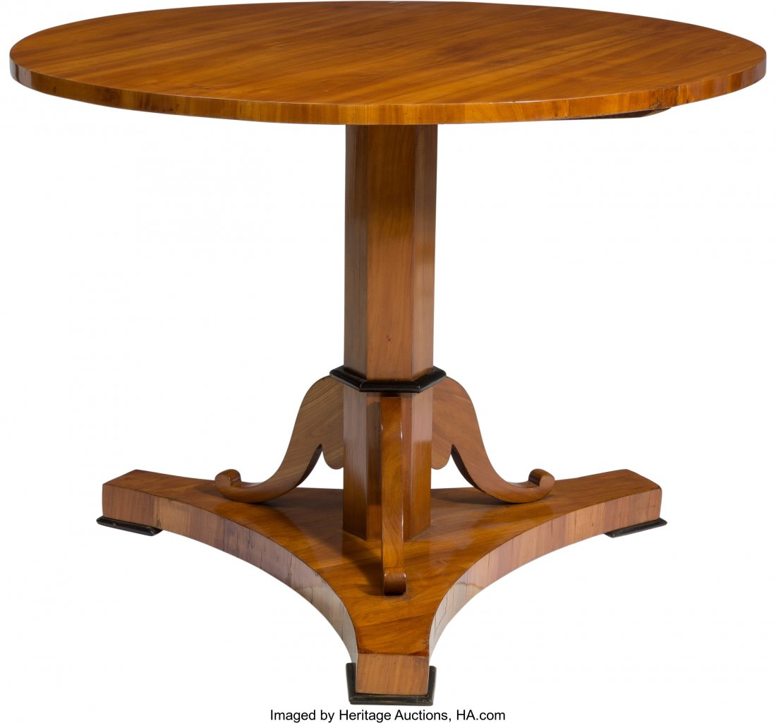 A South German Biedermeier Cherry Center Table, : A South German Biedermeier Cherry Center Table, early 19th century 29-3/4 inches high x 40