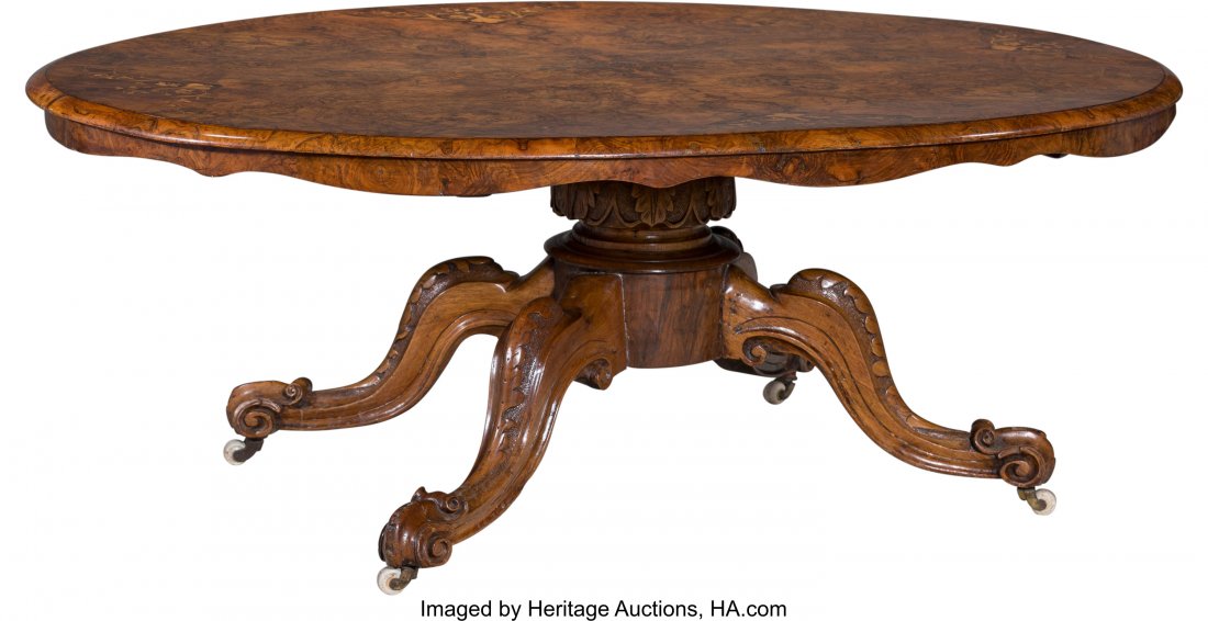 A Victorian Inlaid and Burled Walnut Oval Coffee: A Victorian Inlaid and Burled Walnut Oval Coffee Table, 19th century 21-1/4 h x 57 w x 41 d