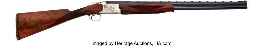 Engraved Browning Over and Under Shotgun. Seria: Engraved Browning Over and Under Shotgun. Serial no. 13216PM163, 20 gauge [2 Â¾ and 3
