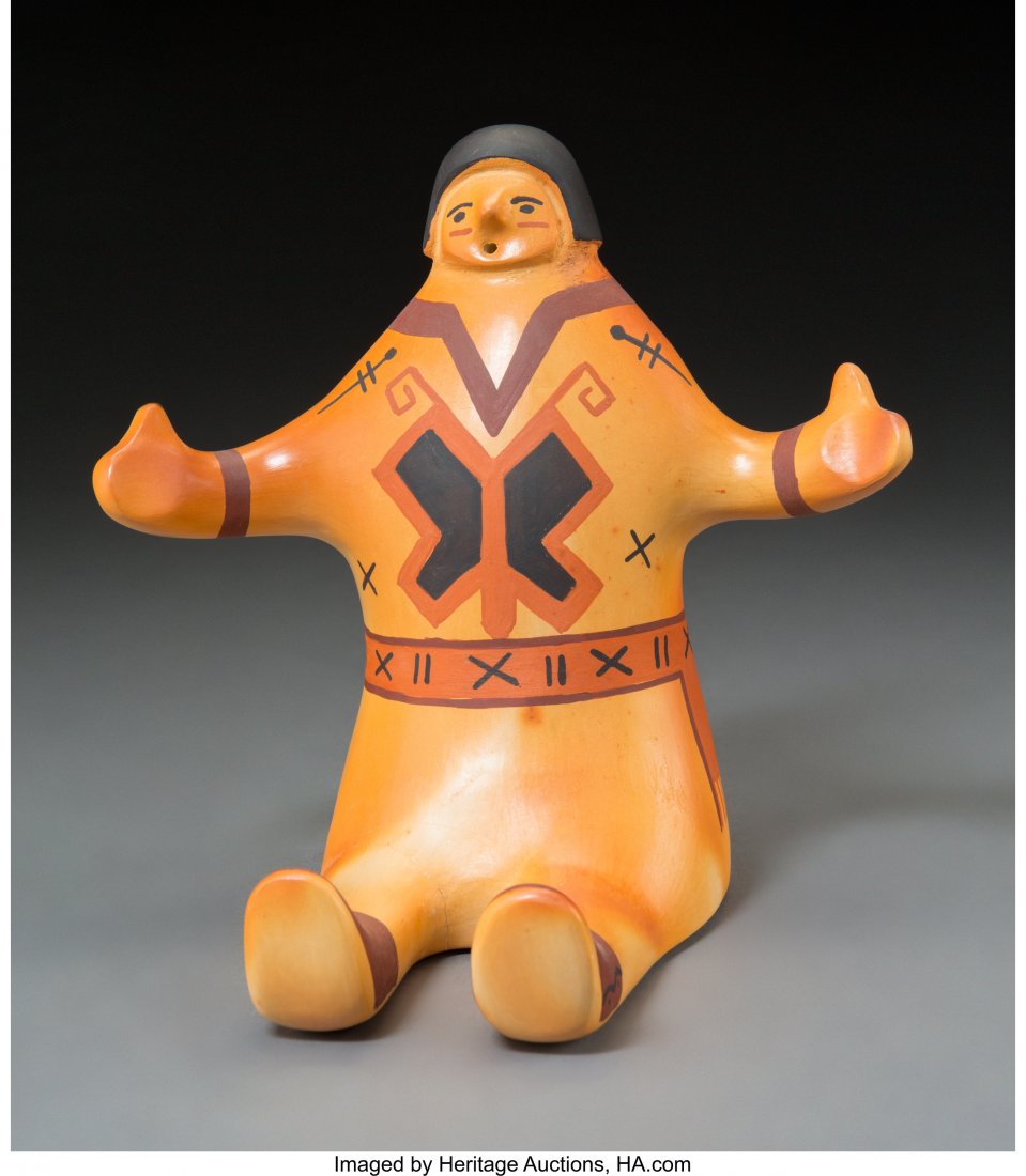 A Hopi Polychrome Seated Figure Larson Goldtooth: A Hopi Polychrome Seated Figure Larson Goldtooth Height: 8 Â½ inches