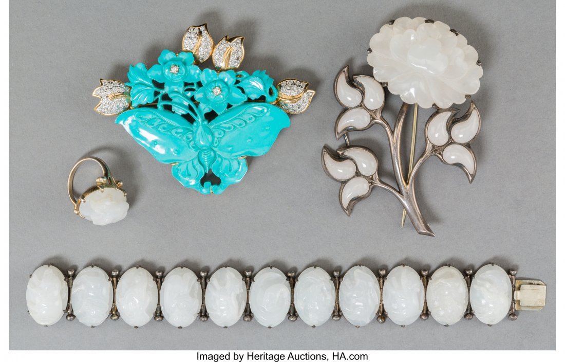A Four-Piece Chinese Carved White Jade, Turquois (1 of 2)